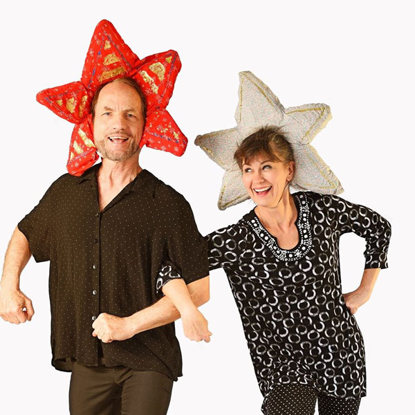 man and woman with star shaped hats
