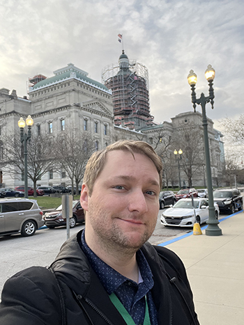 Josh Easter in front of the Indiana State Capitol building.