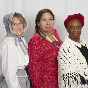 three women together - pioneer white woman, native american woman, african american woman