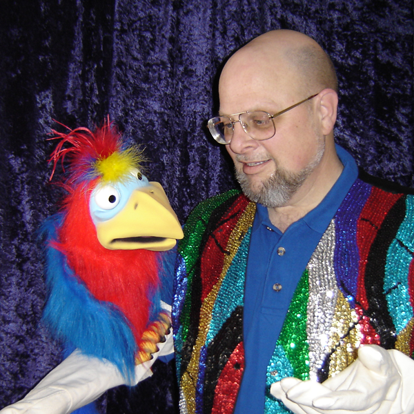 parrot puppet with magician David Lloyd