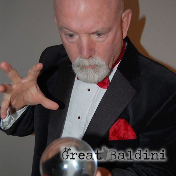 magician man with no hair with crystal ball