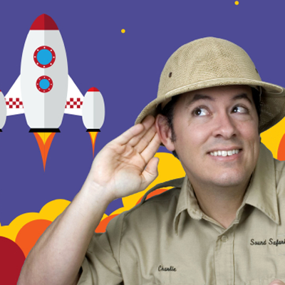 guy in safari outfit listening to space ship